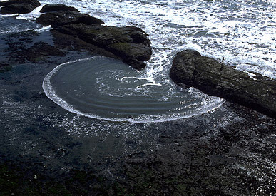Water wave diffracting through a sea wall